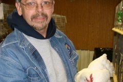 John-Beauchamp-and-one-of-his-fine-White-Plymouth-Rock-bantams